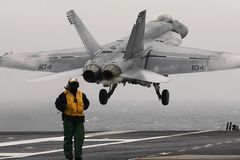 Trump moves Navy strike group toward Venezuela