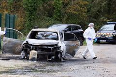 Car attack on French island injures 10