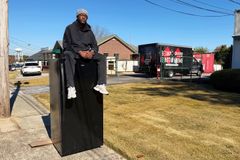 Sitting Atop Fridge to Protest SNAP Cuts, Faith Leader Models Jesus’ ‘Proximity’ to the Poor