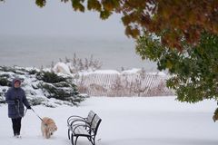 Winter weather slams the Midwest, New England