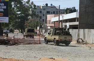 West African troops help Benin government after failed coup