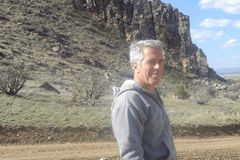 DOJ begins releasing Epstein files, redacted photos