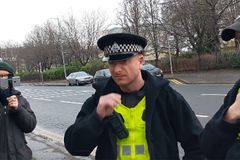 ‘Treated as a criminal’: Grandmother criminally charged for inviting people to chat outside hospital