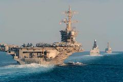 U.S. shot down an Iranian drone near an aircraft carrier, White House says