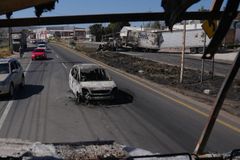 Institutions slowly reopen in aftermath of Mexican cartel chaos