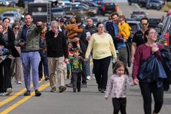 Suspect drives truck into Michigan synagogue, opens fire