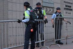 U.S. warns travelers that Hong Kong could demand passwords