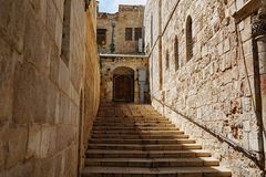 Israel flips security course, lets few into pilgrimage site