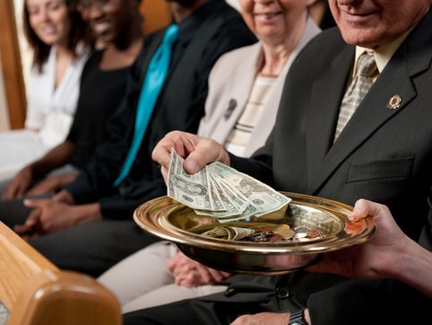 Catholic Church leader resigns after investigation finds evidence of financial misconduct