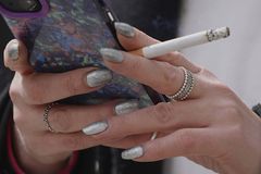 British lawmakers advance smoking ban for people born after 2008