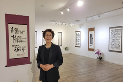 Calligraphy exhibition draws attention with 70-meter handwritten Gospel of John scroll