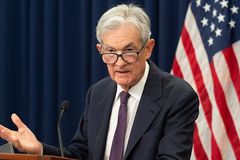 Divided Federal Reserve keeps interest rates steady