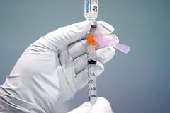 U.S. accuses Chinese man of hacking COVID medical research