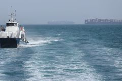 U.S. pauses Strait of Hormuz shipping escorts for talks