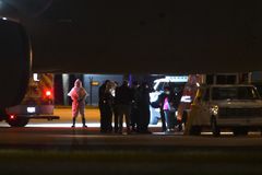 Hantavirus ship guests, 17 from U.S., leave in stages