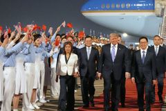 Trump arrives in Beijing for high-stakes economic talks