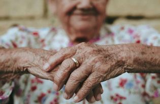 My sisters are financially abusing our grandmother. Need advice.