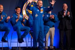 NASA names Artemis III crew for mission next year