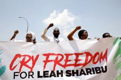Nigerian officials facing global pressure to fight radical jihadists persecuting women, girls
