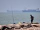 Evacuation paused in Strait of Hormuz after ship hit