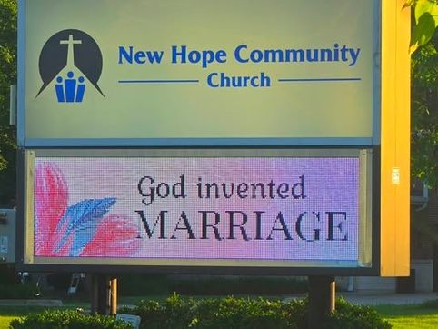 Chicago-area church stands ground on sign after LGBT activists protest