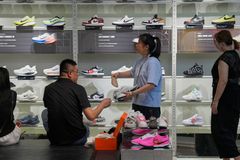 Dozen charged with running Nike warehouse theft ring