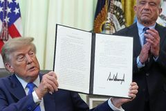 Trump signs order reducing, splitting recommended infant vaccinations