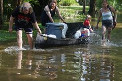 At least 7 dead from record floods in central Indiana