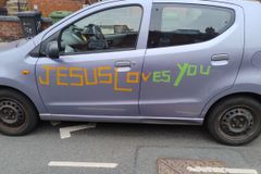 Christian Motorist Denied Insurance Coverage Due to 'Jesus Loves You' Message | CBN