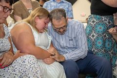 Why two churches came back together after six decades apart