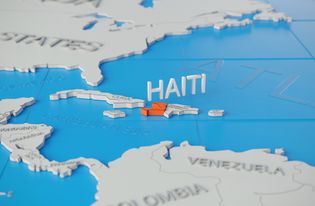 Dozens killed in gang attack on church shelter in Haiti