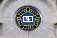 먼저 밀친 보행자에 반격한 기사 벌금 50만 원