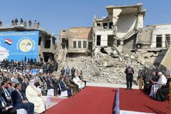 Pope Francis prays for victims of war in ruins of Mosul