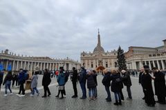 ‘We love Benedict’: Catholics flock to the Vatican to say goodbye to Benedict XVI