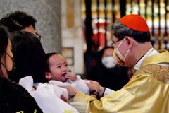 Baptizing kids, Cardinal Tagle says faith can’t be measured by ‘pakimkim’