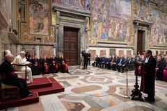 Vatican police seize documents, computers in finance probe