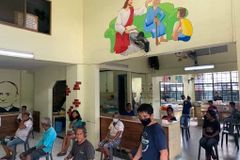 Authorities balk as church center opens doors for poor