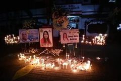Parish holds candle-lighting for slain barangay chair