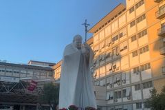 Pope Francis to continue treatment at hospital, Vatican says