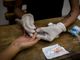 People living with HIV in Philippines to double by 2030, health official warns