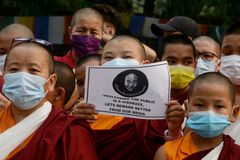 Tibetans abroad rally in support of Dalai Lama following outrage over video