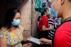 Caritas Manila distributes P20M in GCs to urban poor