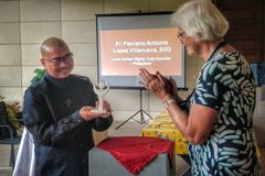 Priest honored for work with families of victims of drug-related killings