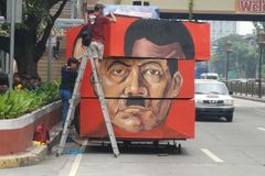 Protests, counter-protests mark martial law anniversary