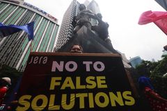 In Photos: Groups hold protest against Japan’s ‘largest fossil fuel funders