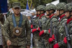 Philippine military says will send more supplies to disputed reef