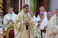 Cardinal Tagle calls for policies to protect workers
