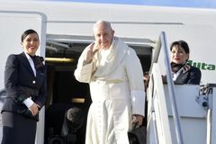 On flight to Panama, Pope confirms November trip to Japan