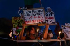 Migrant group mourns death of 2 Filipinos in Palestine