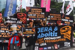 Climate activists protest against fossil gas promotion in Asia